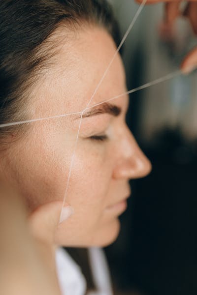 Eyebrow threading by Nisha Beauty Salon Kuwait
