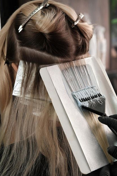 Hair coloring and styling by Nisha Beauty Salon Kuwait
